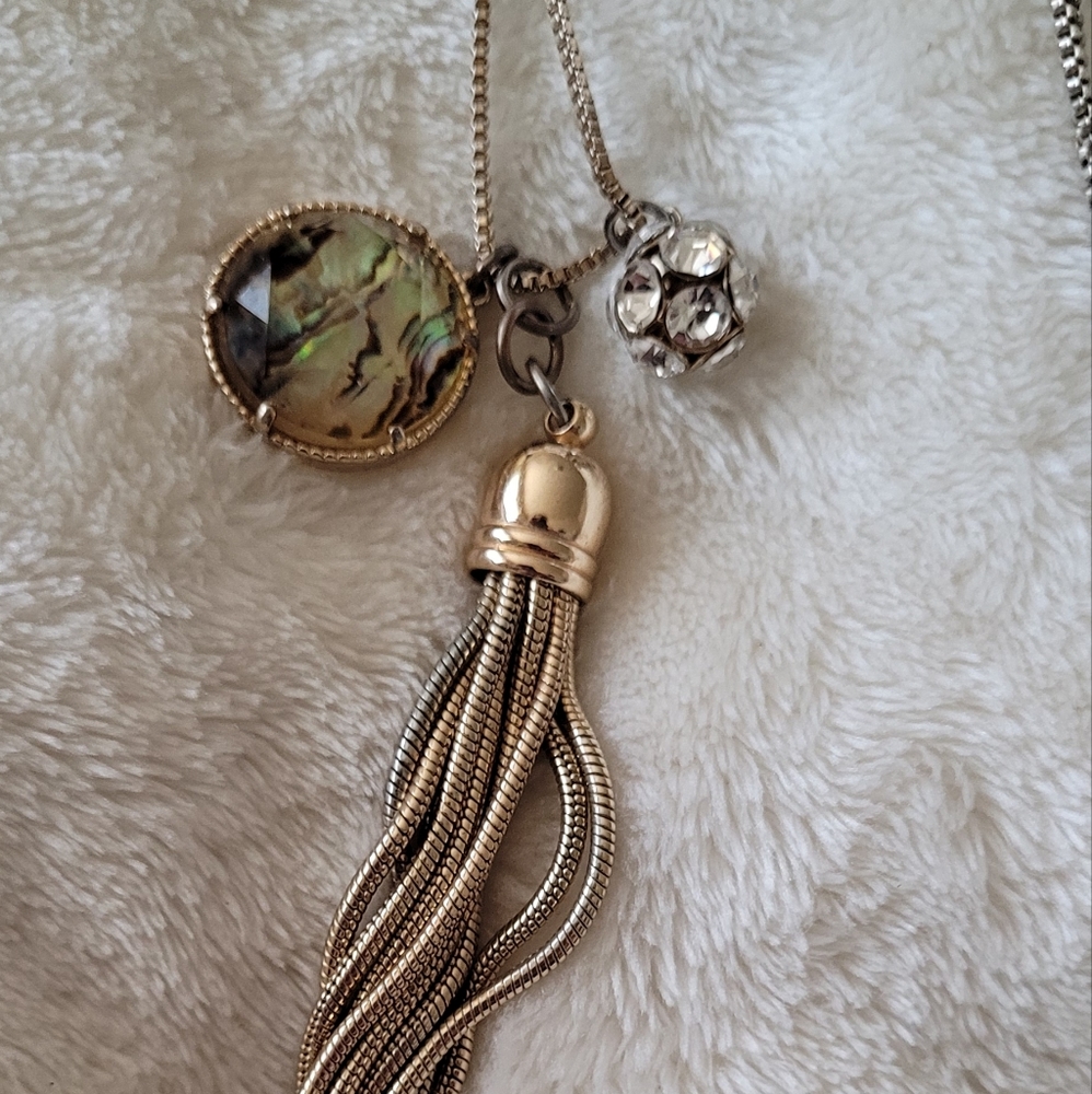 Gold toned Necklace with an Abalone pendant and a "disco ball" bead. Bella/Jack